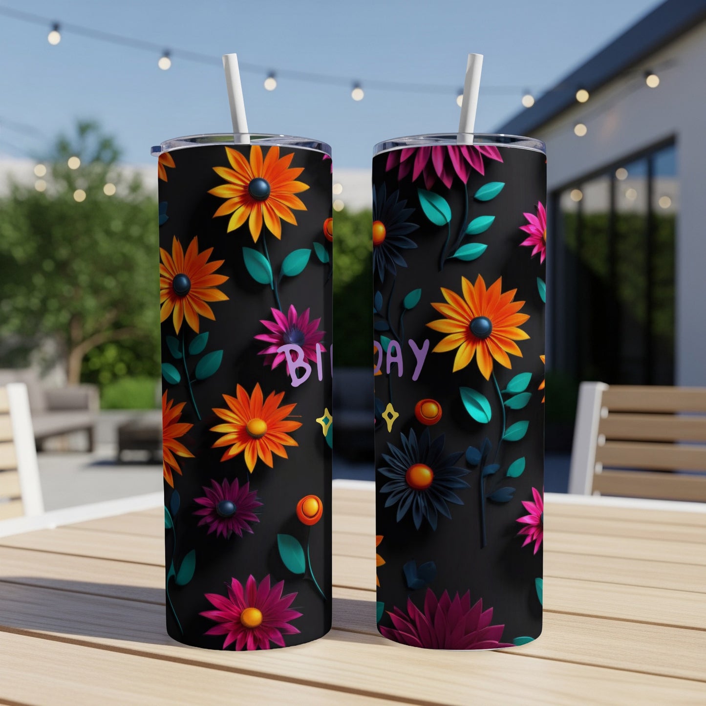 Two black tumblers with colorful floral designs and "Birthday" text.
