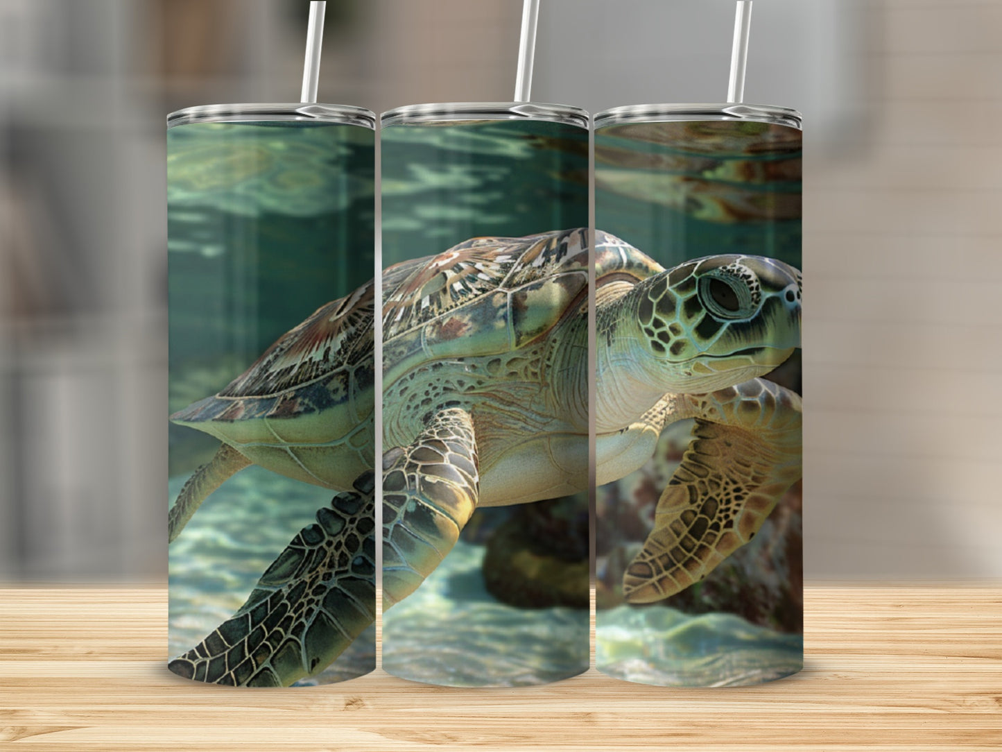 Three tumblers featuring a sea turtle swimming underwater.