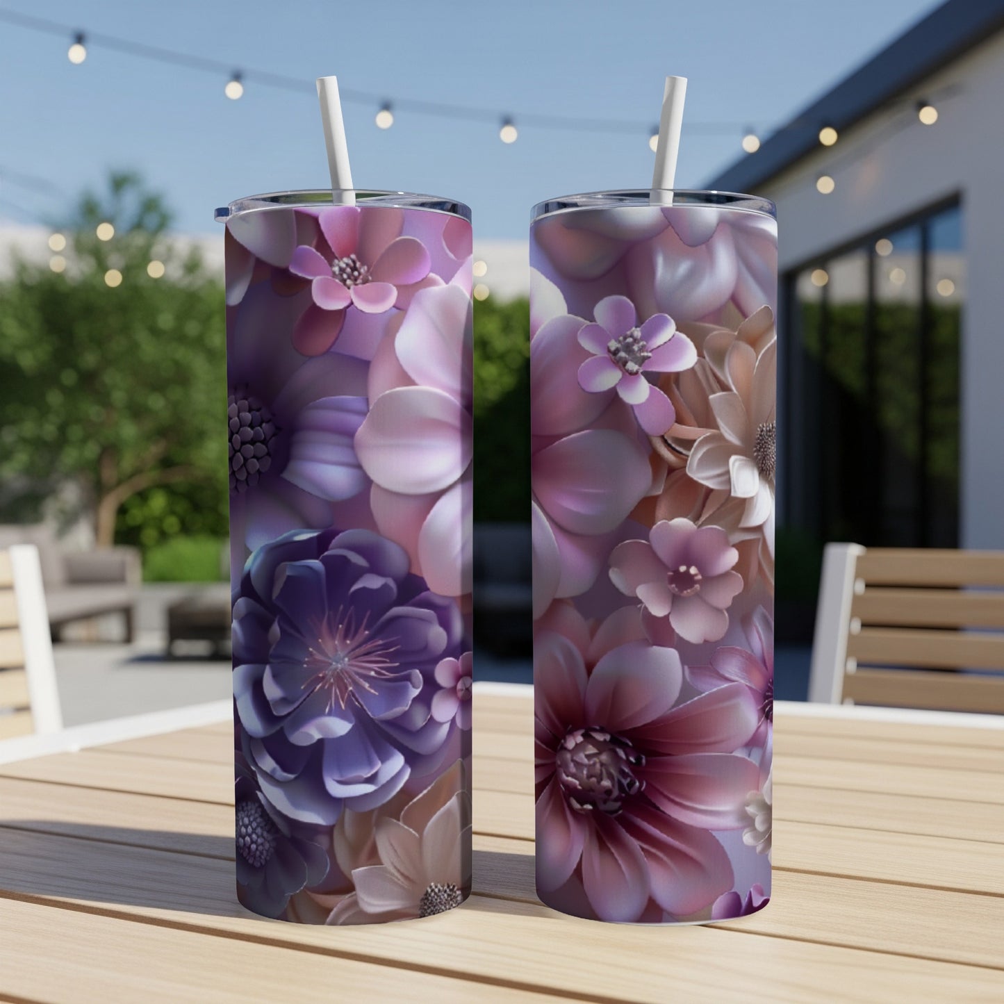 Two tall tumblers with floral designs in shades of pink and purple.