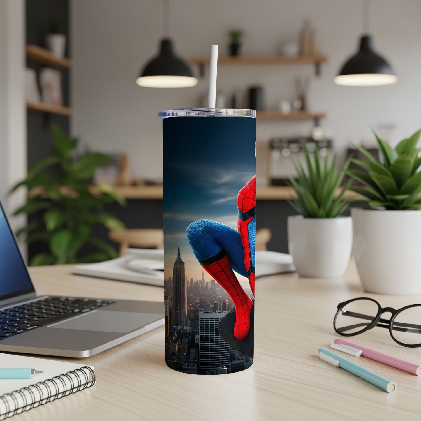 Spiderman in dynamic pose against New York City skyline on a tumbler.