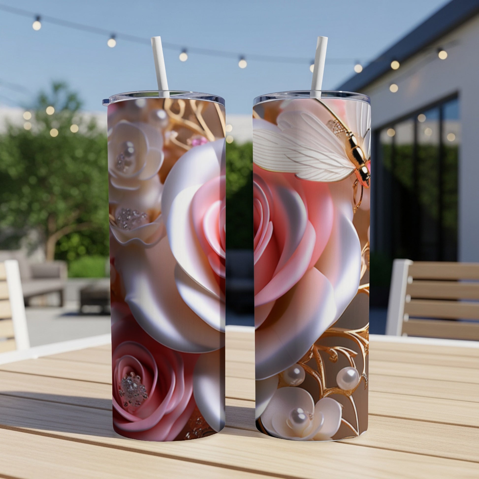 Two tall tumblers with pink roses, pearls, and gold accents.