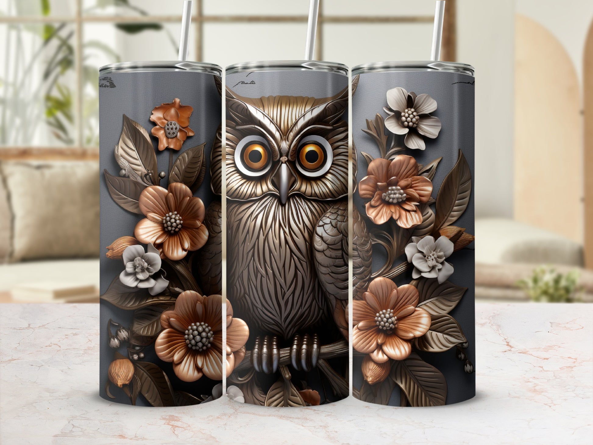 Triptych of tumblers featuring a central owl design with floral accents.