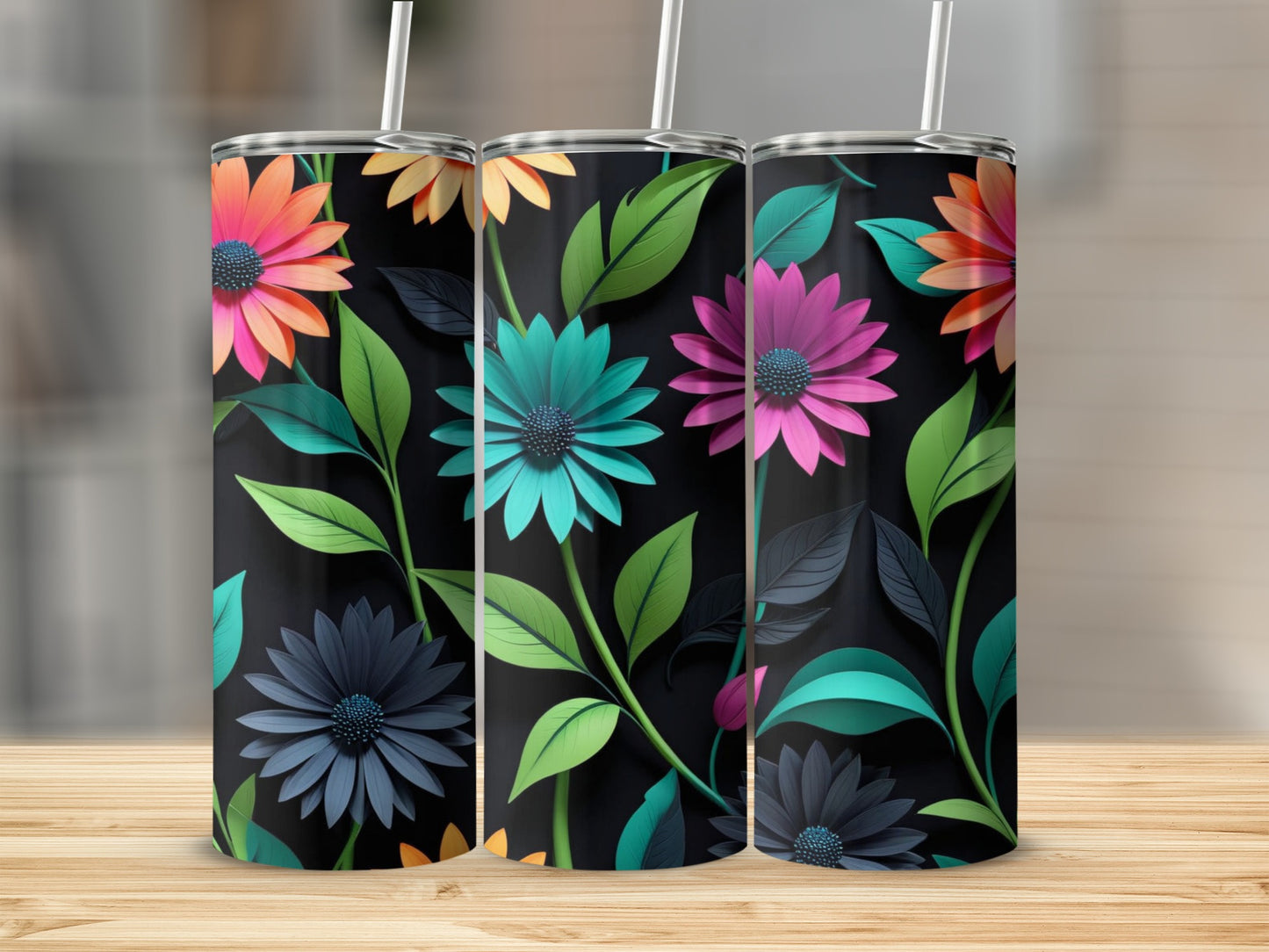 Three tumblers with a floral design featuring pink, orange, and teal flowers.