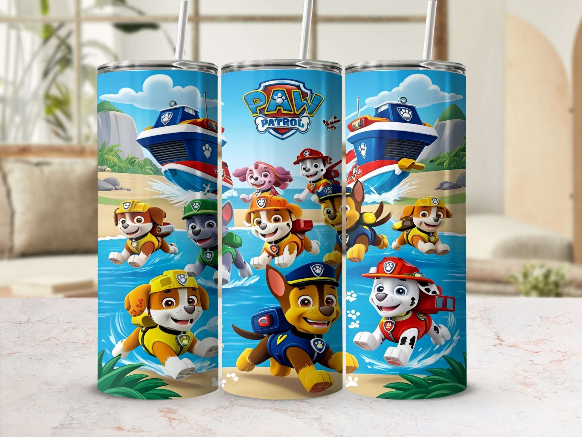 Paw Patrol characters on a blue tumbler with a boat and ocean scene.