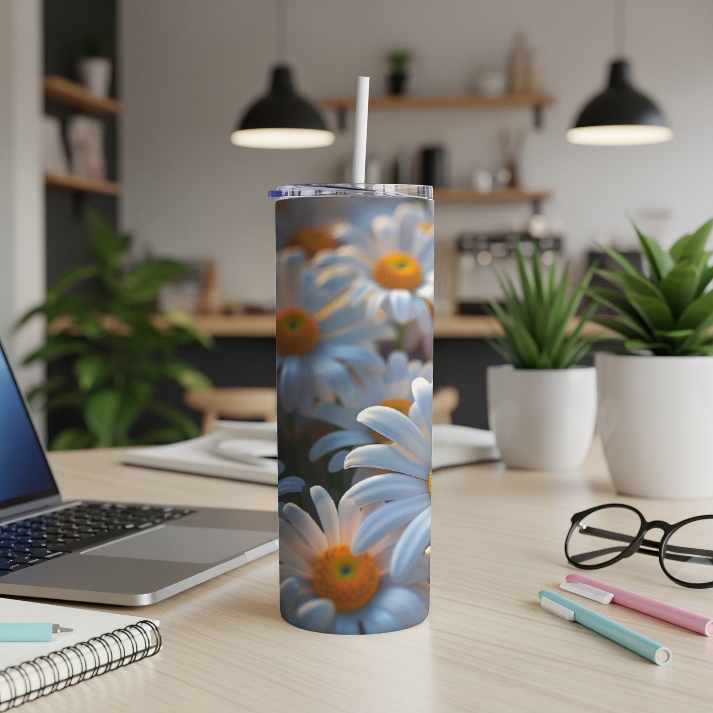 Daisy flowers design on a white tumbler with a straw.
