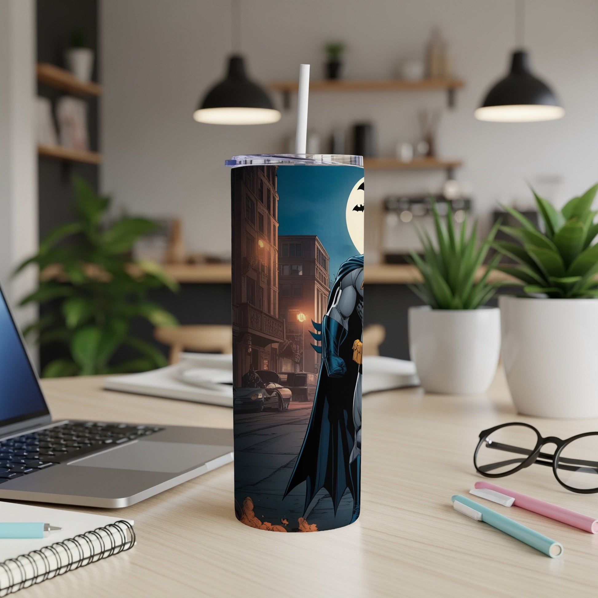 Batman character design on a tall, skinny tumbler with a straw.