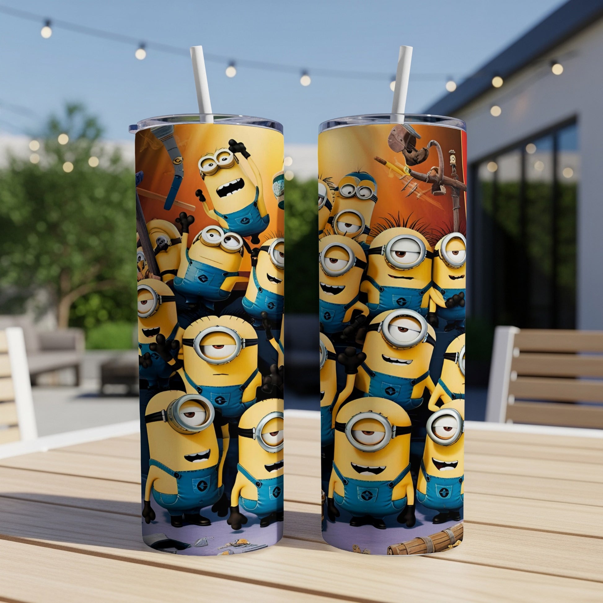 Minions characters on two tall travel tumblers with straws.