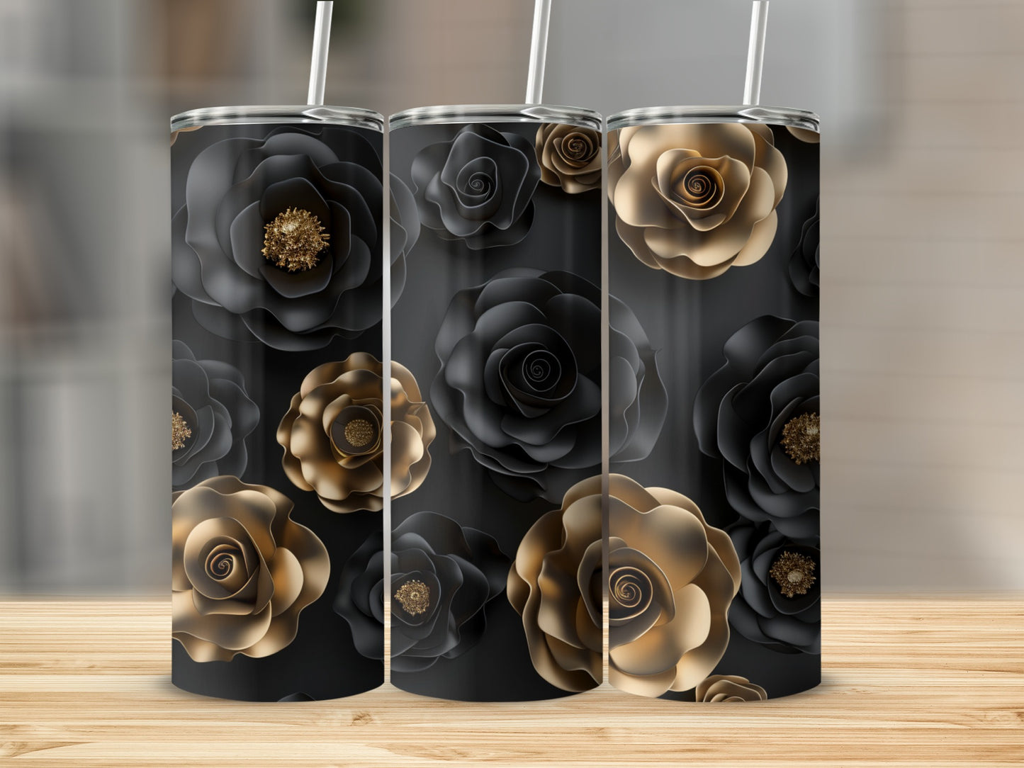 Three tumblers with black and gold rose floral pattern.
