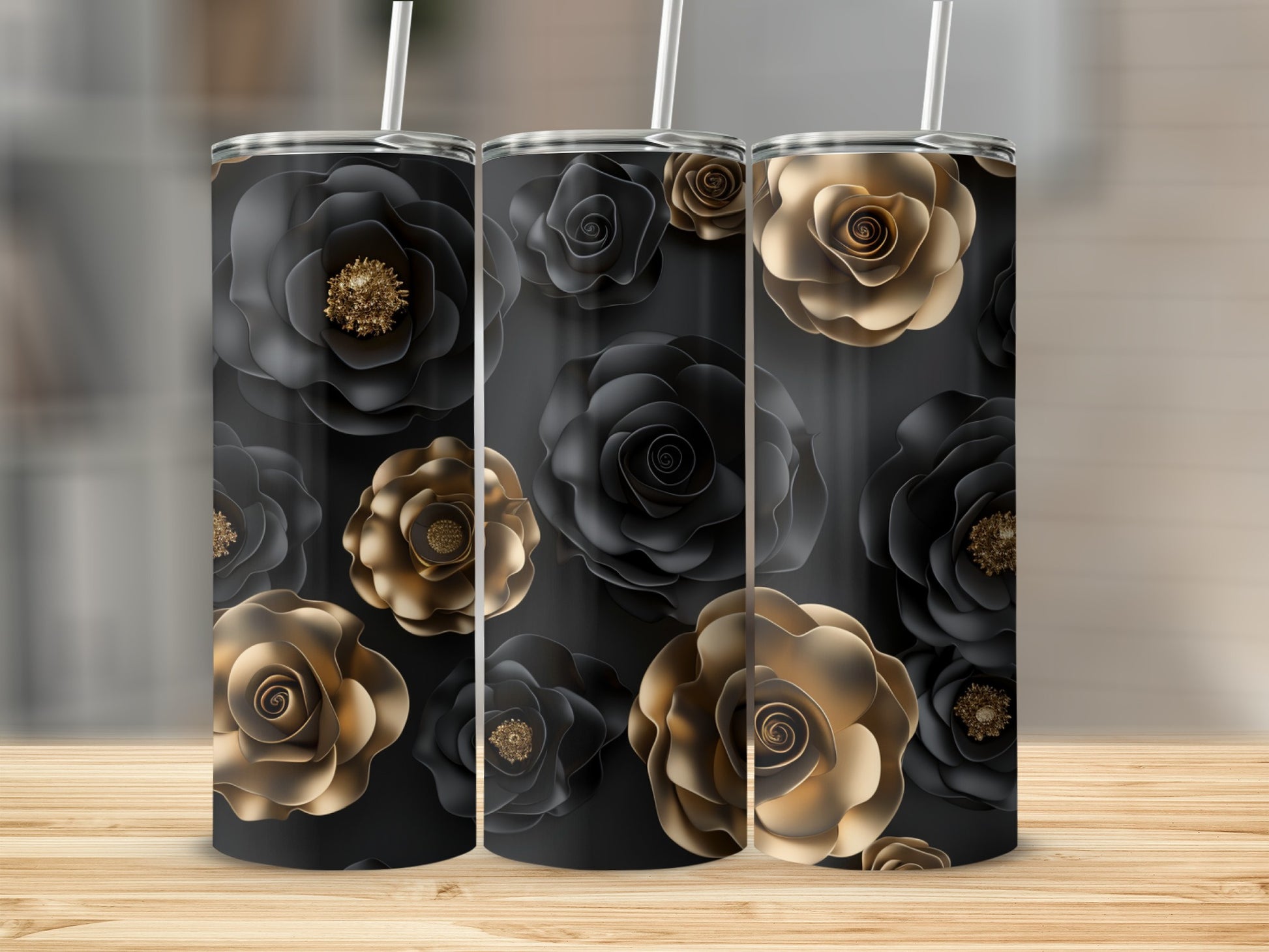 Three tumblers with black and gold rose floral pattern.