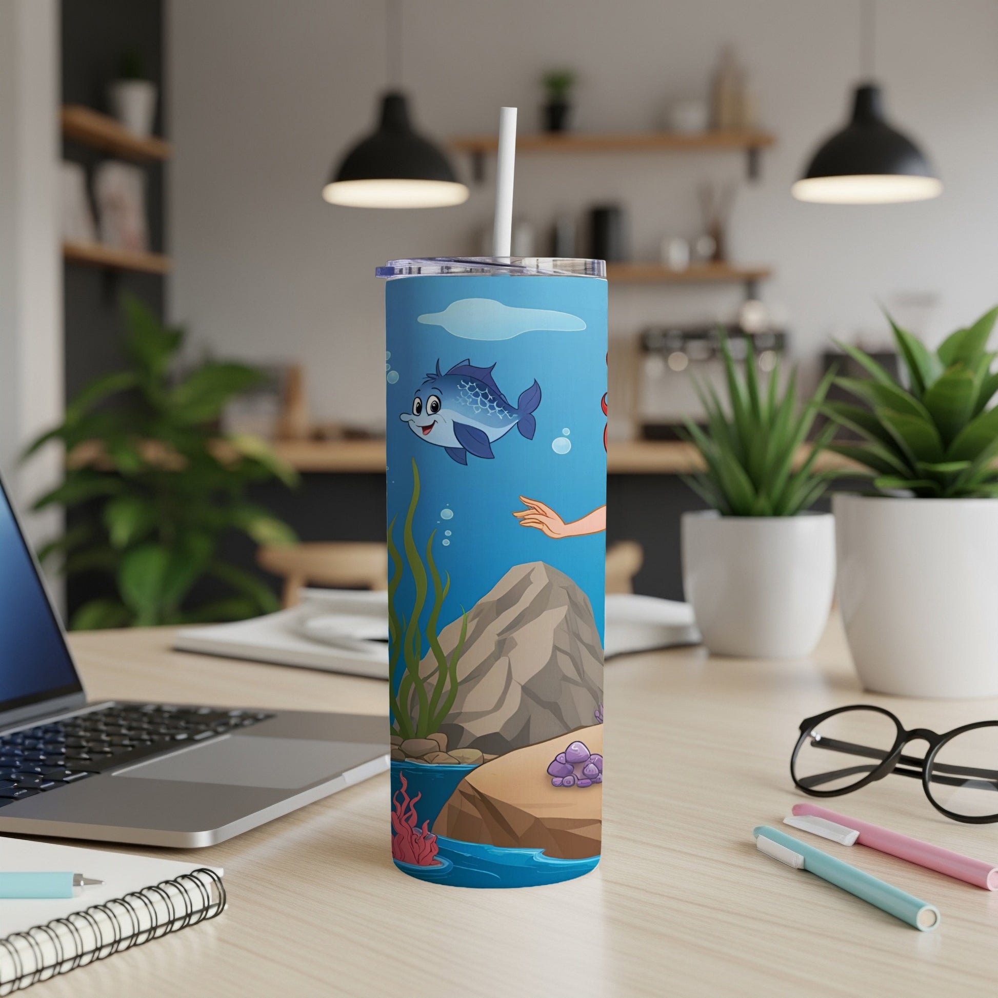 Blue and pink tumbler with cartoon fish and coral underwater scene.