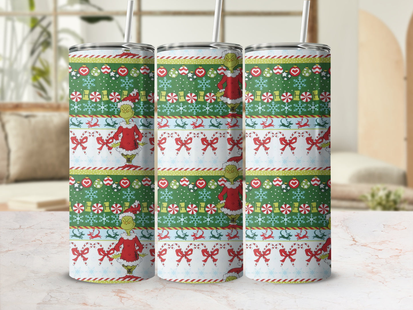Green Grinch Christmas tumbler with snowflakes and candy canes.