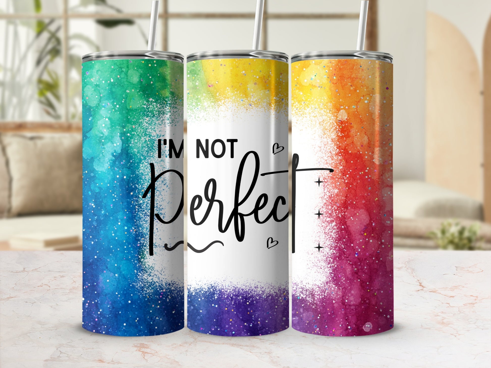 Three tumblers with rainbow glitter design and "I'm Not Perfect" text.