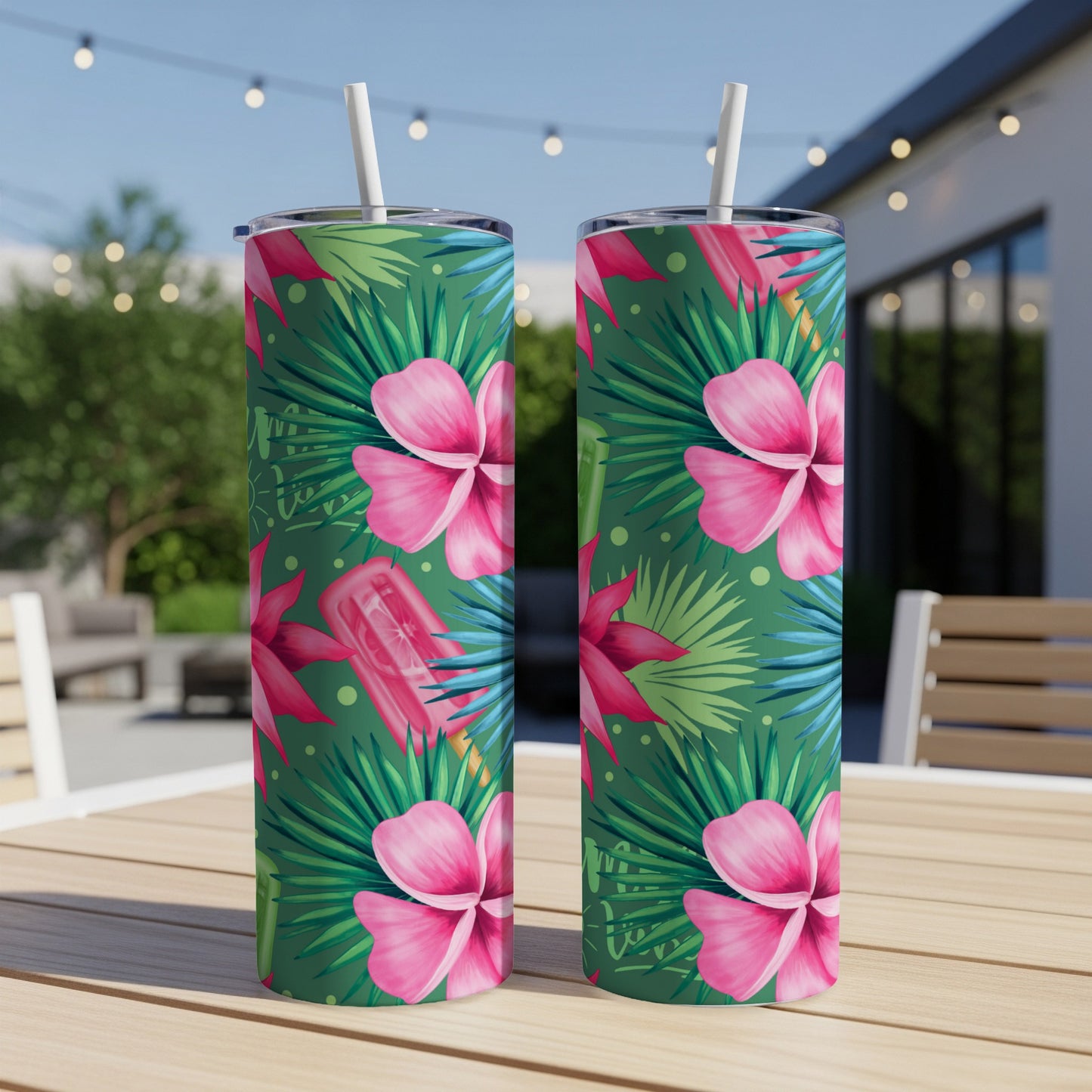 Two tumblers with pink hibiscus and green tropical leaves pattern.
