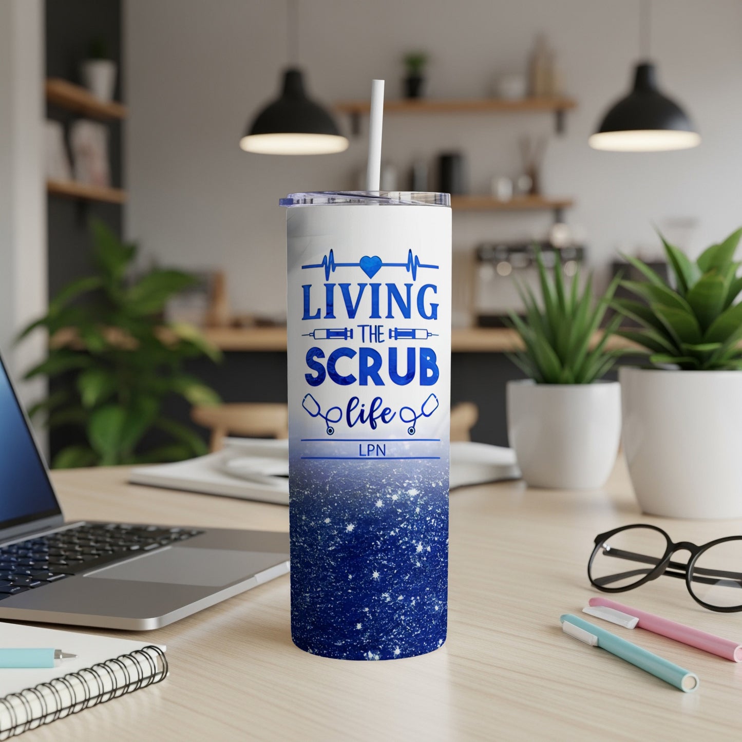 Blue glitter tumbler with "Living the Scrub Life LPN" text.