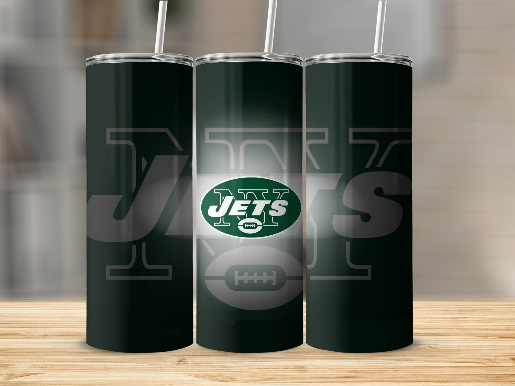 Three tumblers with the New York Jets logo and football design.