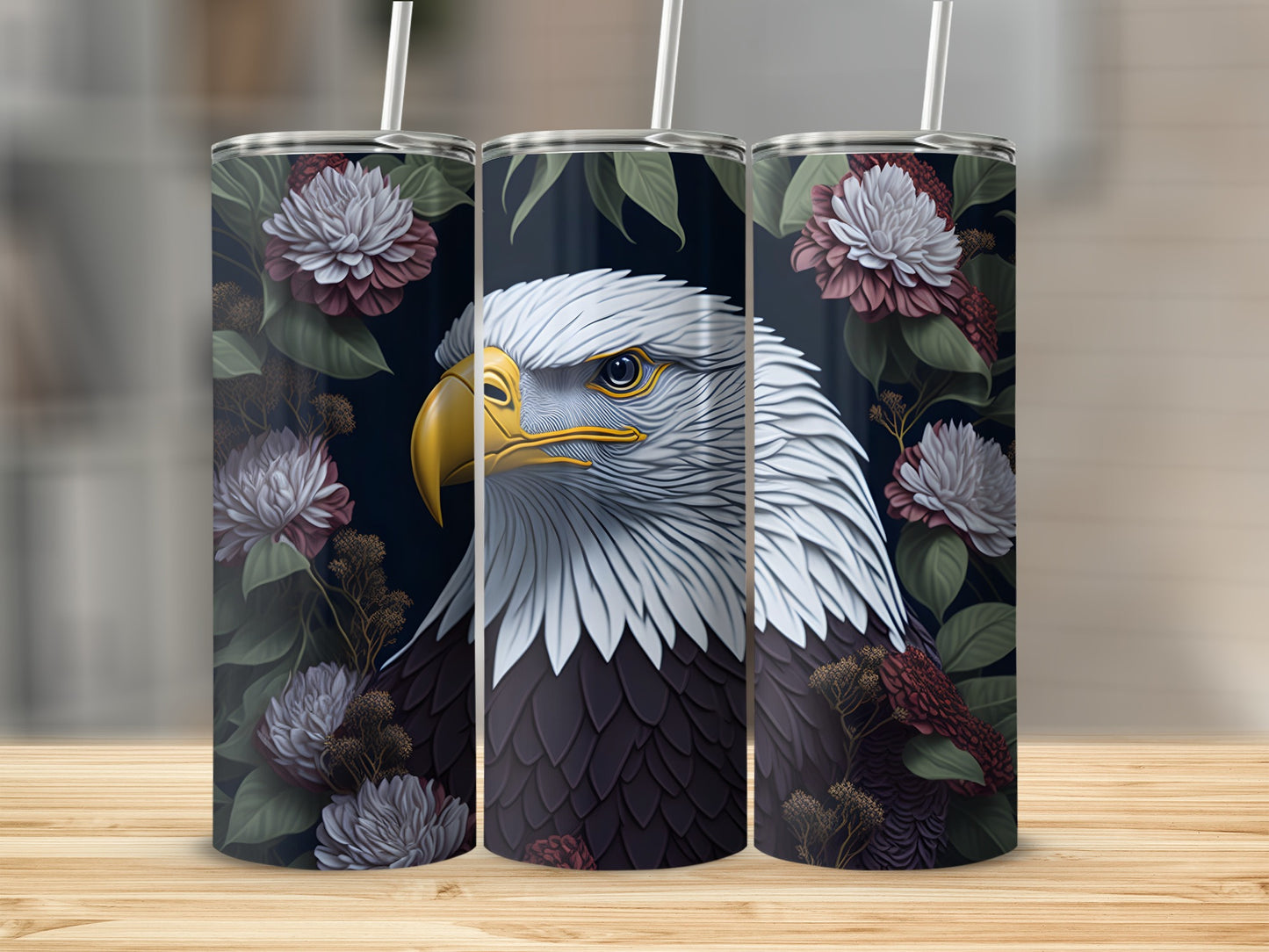 Tumbler with eagle and floral design.