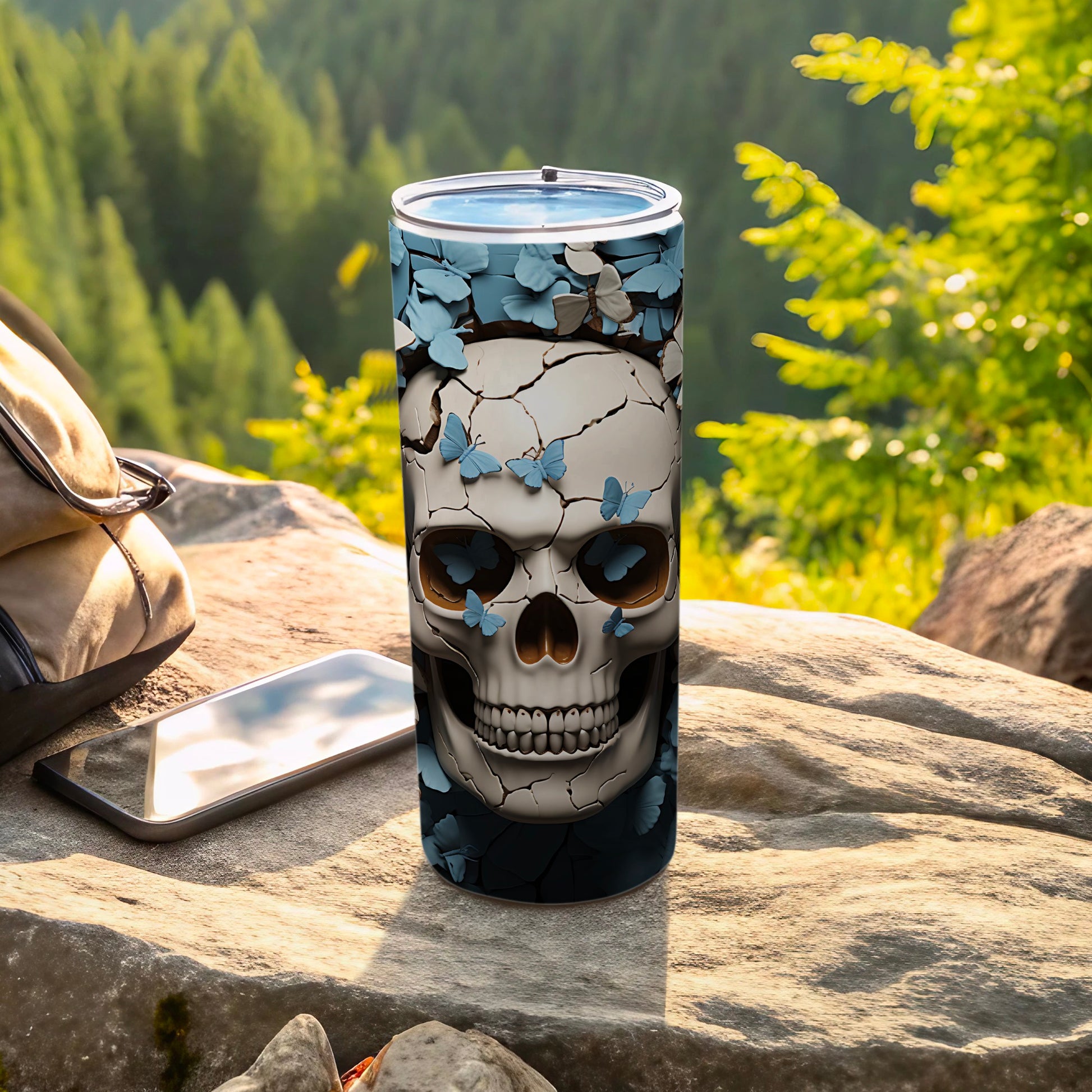 Skull tumbler with blue butterflies and cracked white overlay.