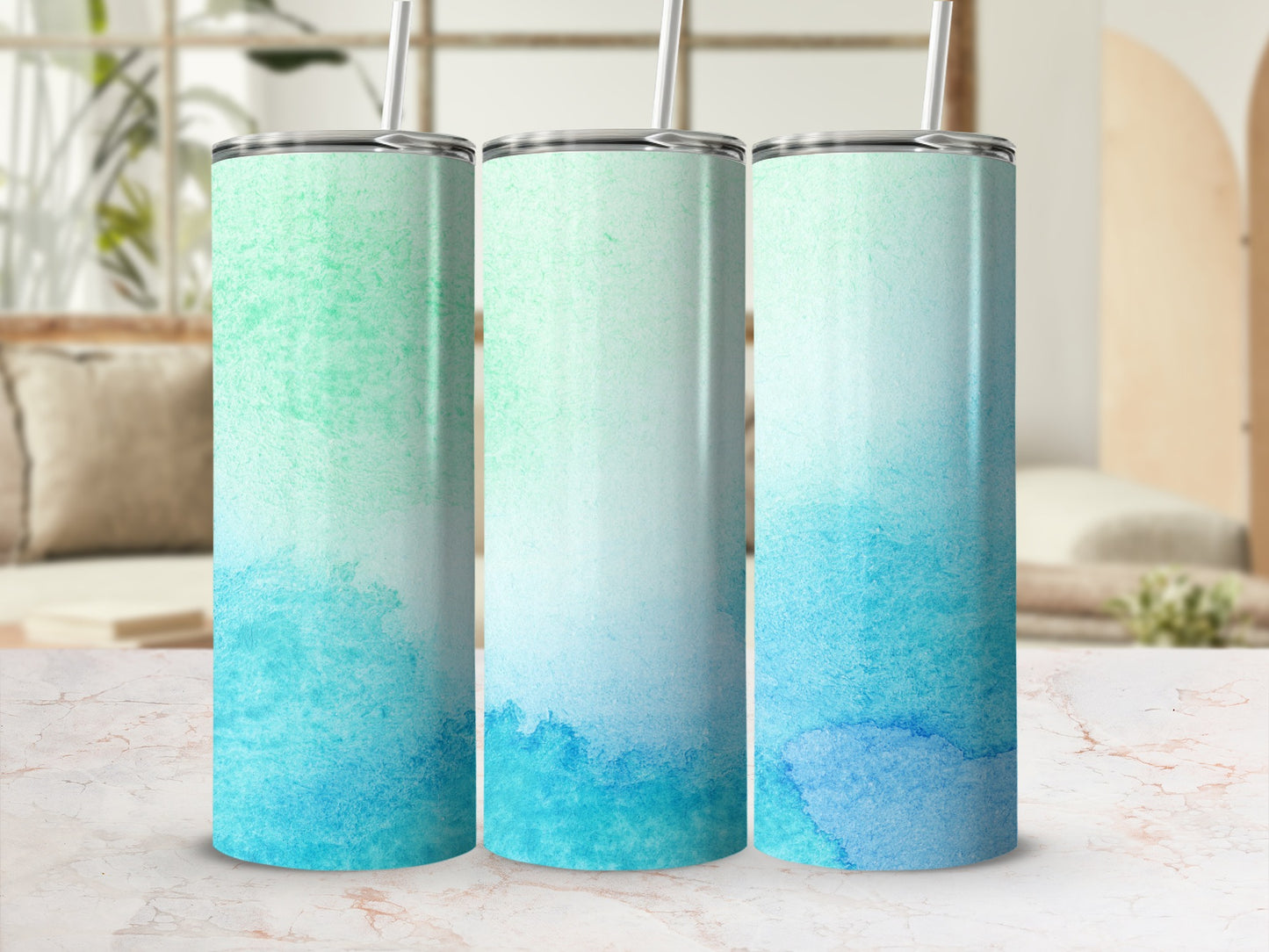 Three tumblers with a watercolor gradient from green to blue.