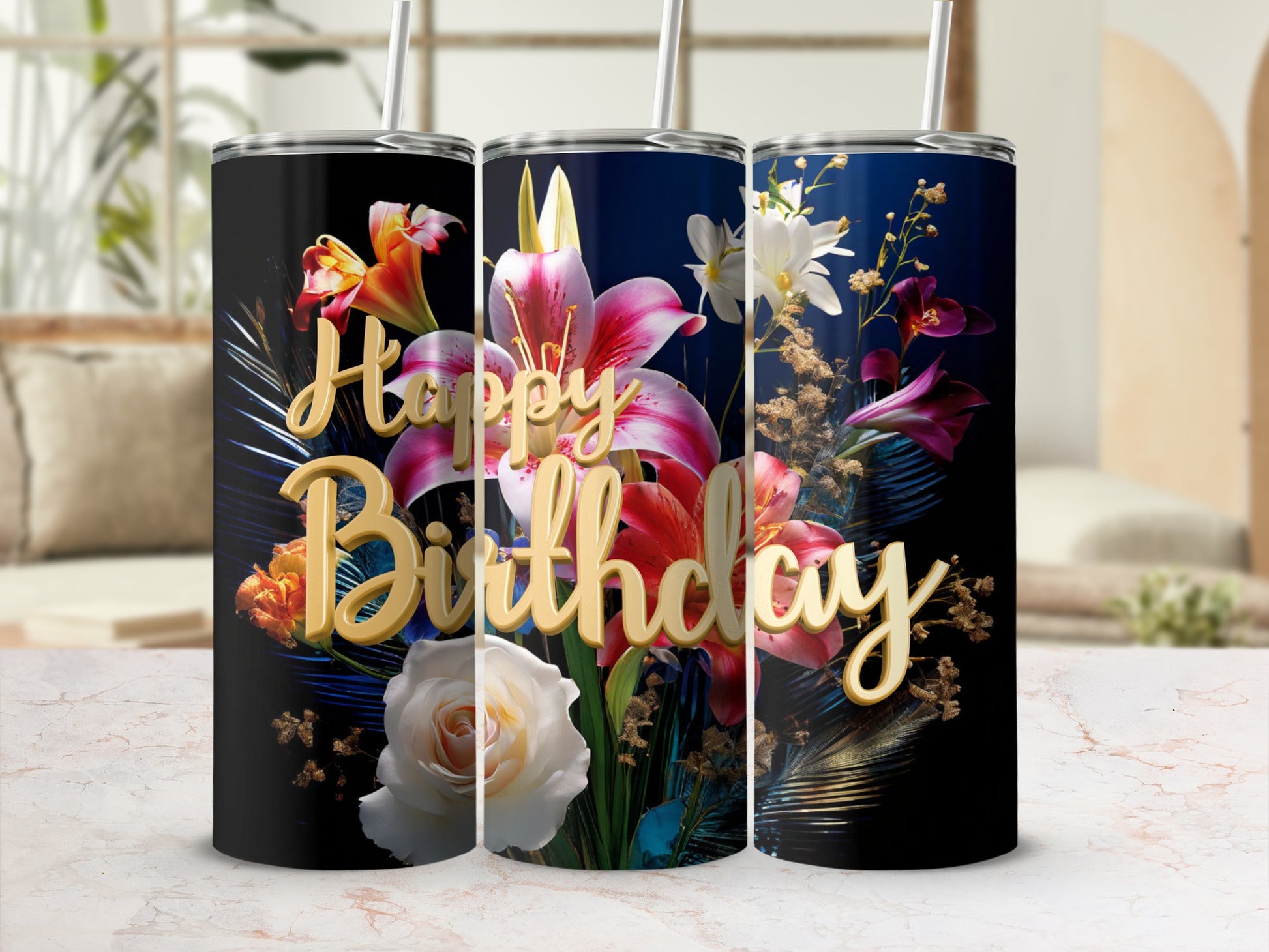 Black tumblers with "Happy Birthday" in gold, surrounded by floral and palm leaf designs.