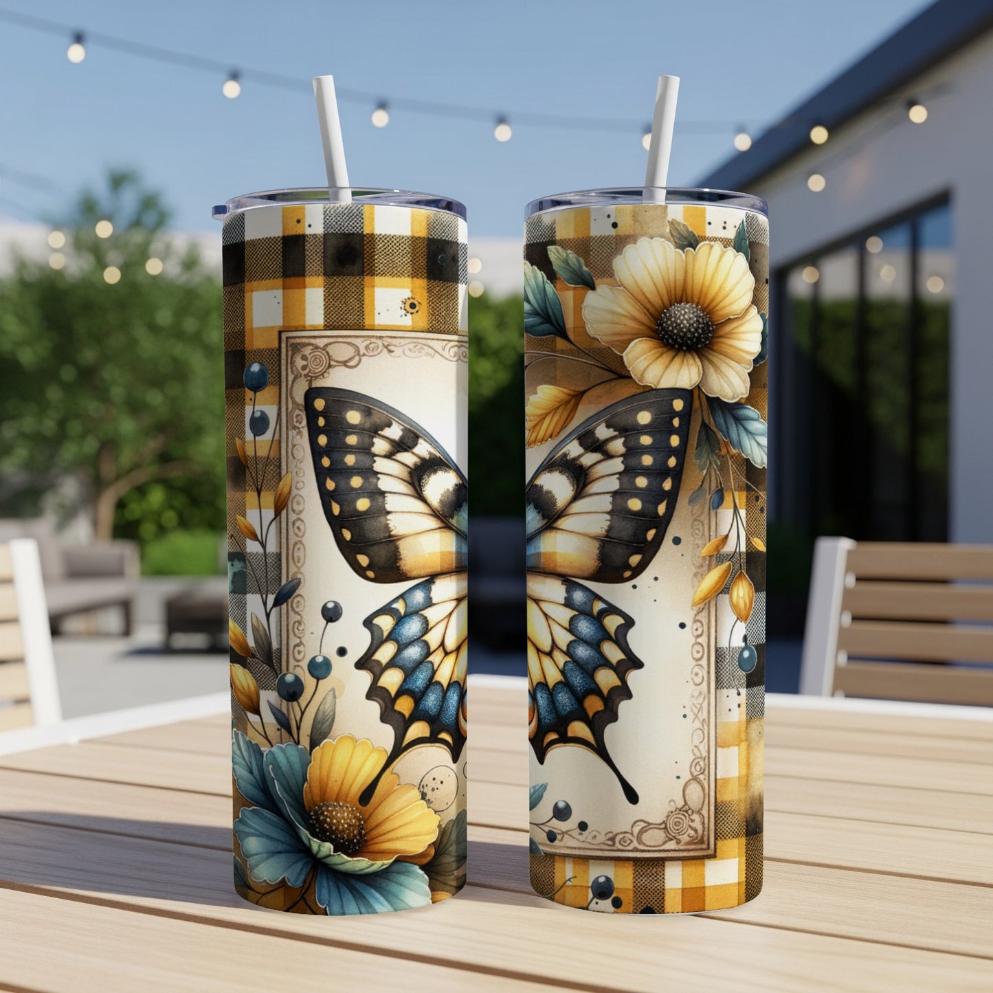 Two tumblers with yellow plaid and butterfly designs, set on a table.