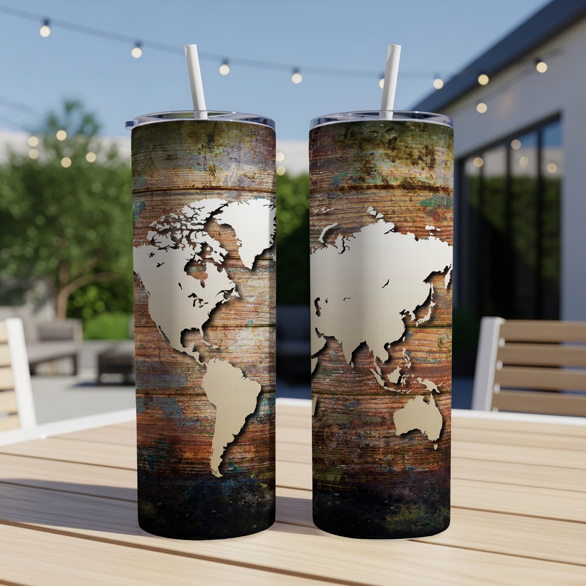 Tumbling world map design on weathered wood textured tumblers with straws.