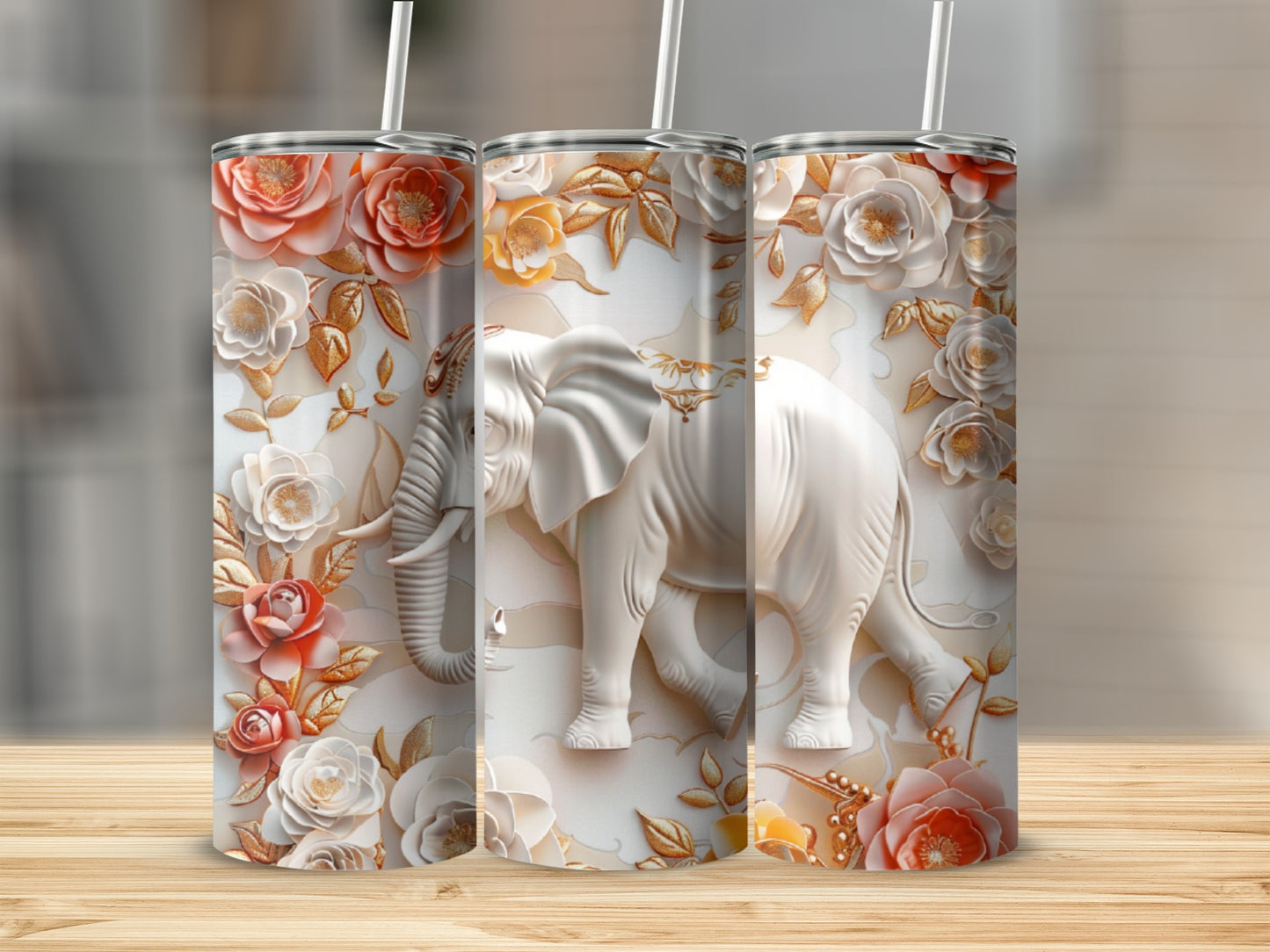 White embossed elephant with floral accents on a tumbler.