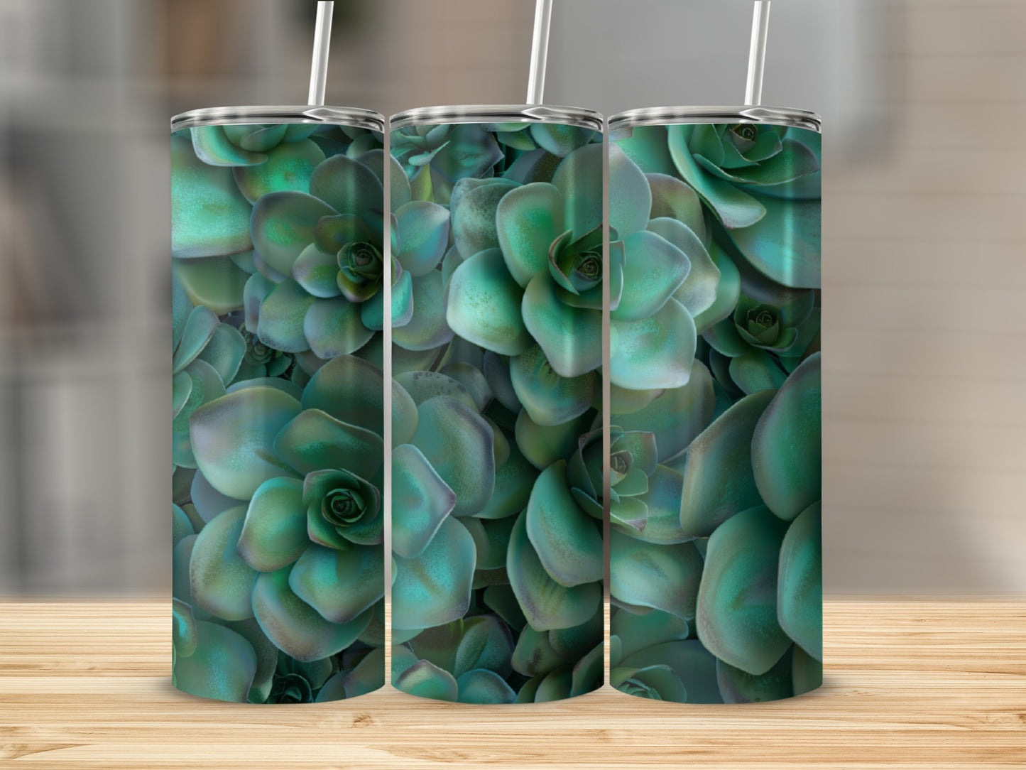 Three tumblers with a repeating pattern of green succulent plants.