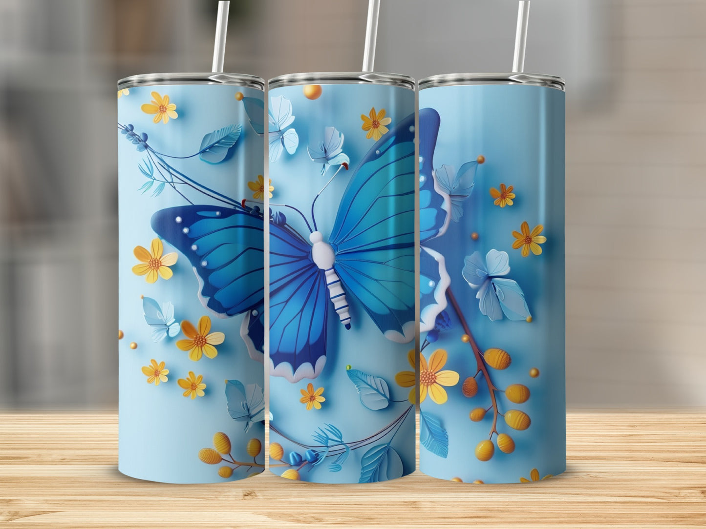 Light blue tumbler with blue butterfly and yellow floral accents.