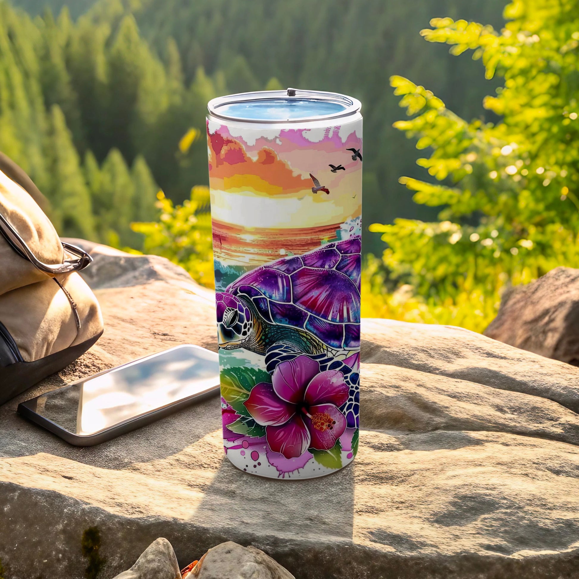 Tumbler with purple sea turtle, hibiscus flower, and sunset beach scene.