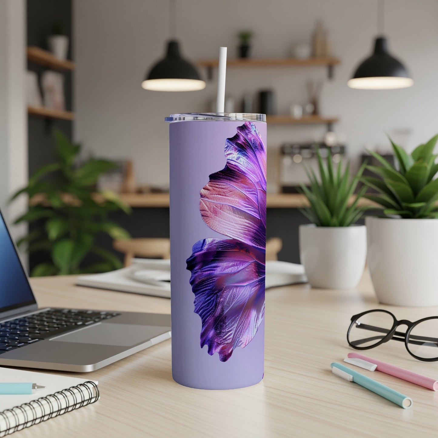 Purple tumbler with iridescent fish scale pattern and straw.