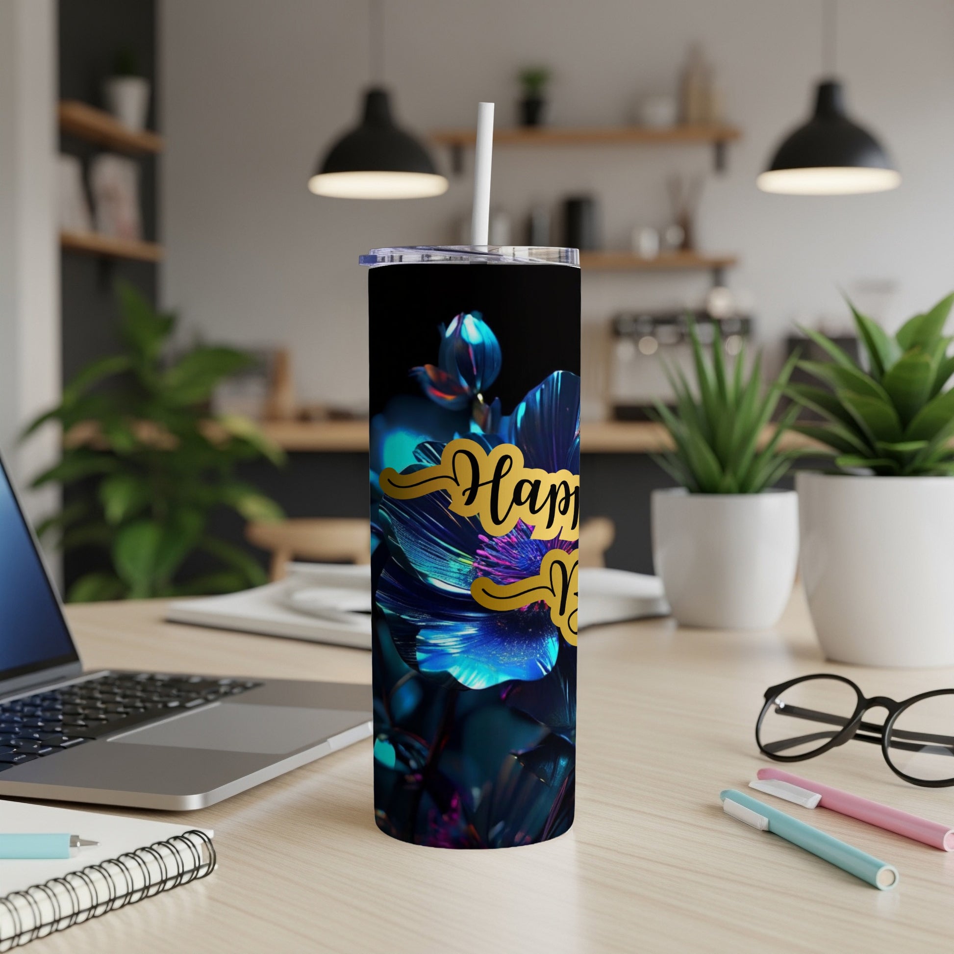 Tall tumbler with a blue floral design and "Happy" text.