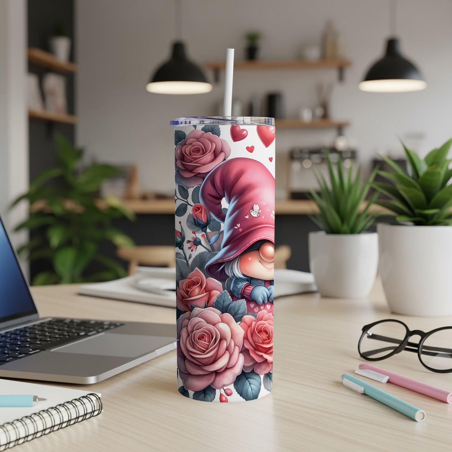 Gnome and roses design on a white tumbler with a straw.