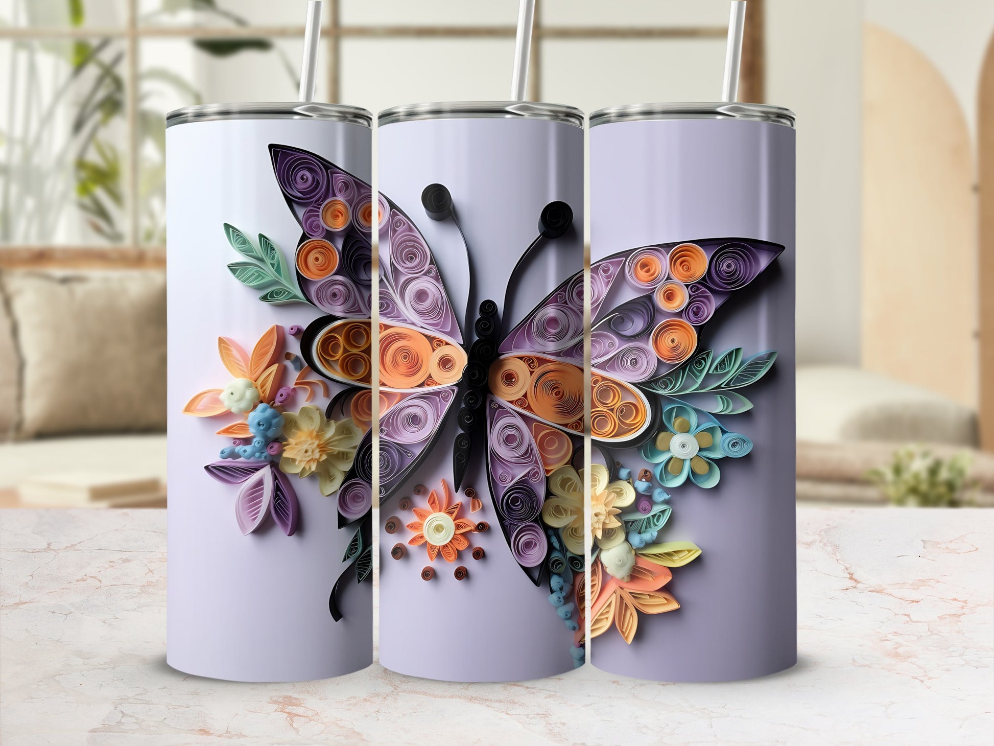 Three tumblers with a purple-toned quilled butterfly and floral design.