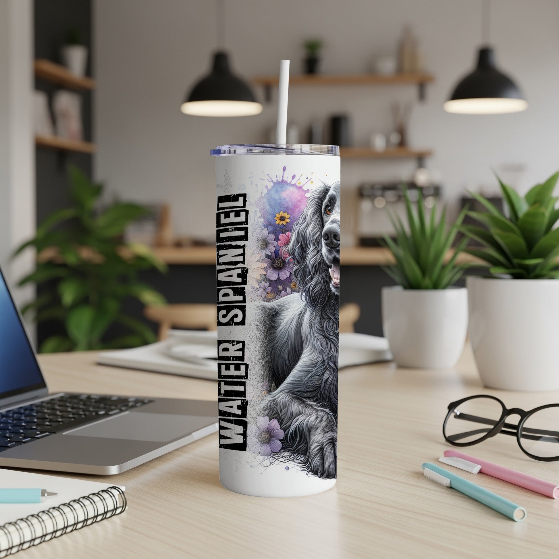 Black Cocker Spaniel artwork on a white tumbler with straw.