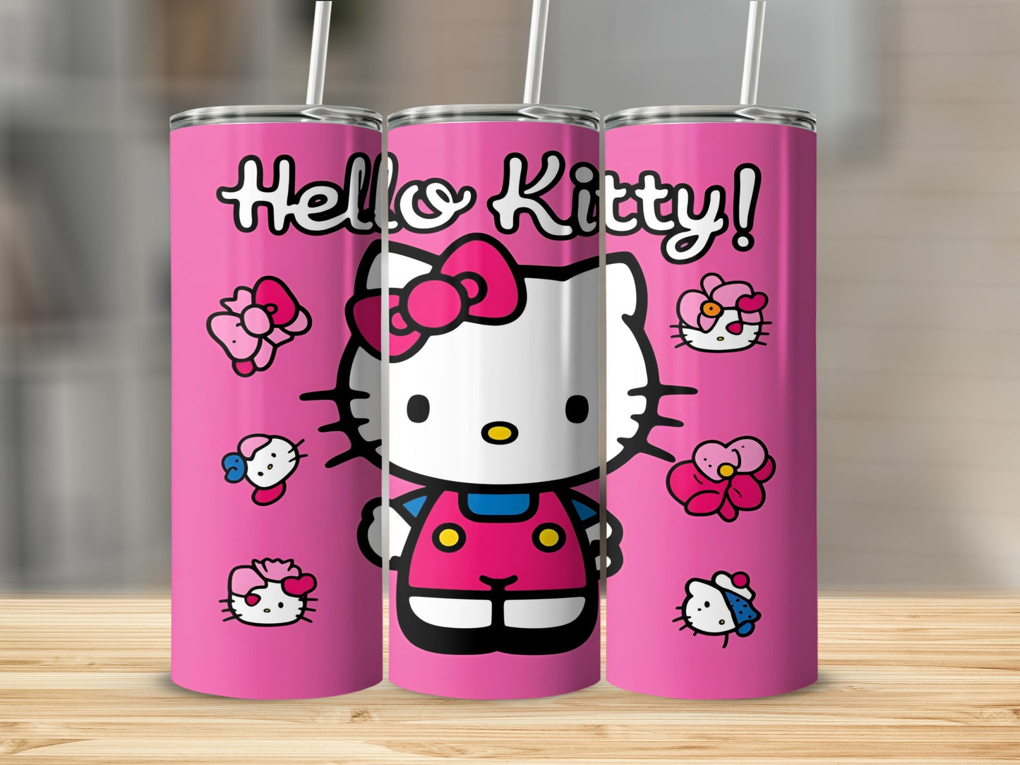 Pink tumbler with Hello Kitty character and bow.