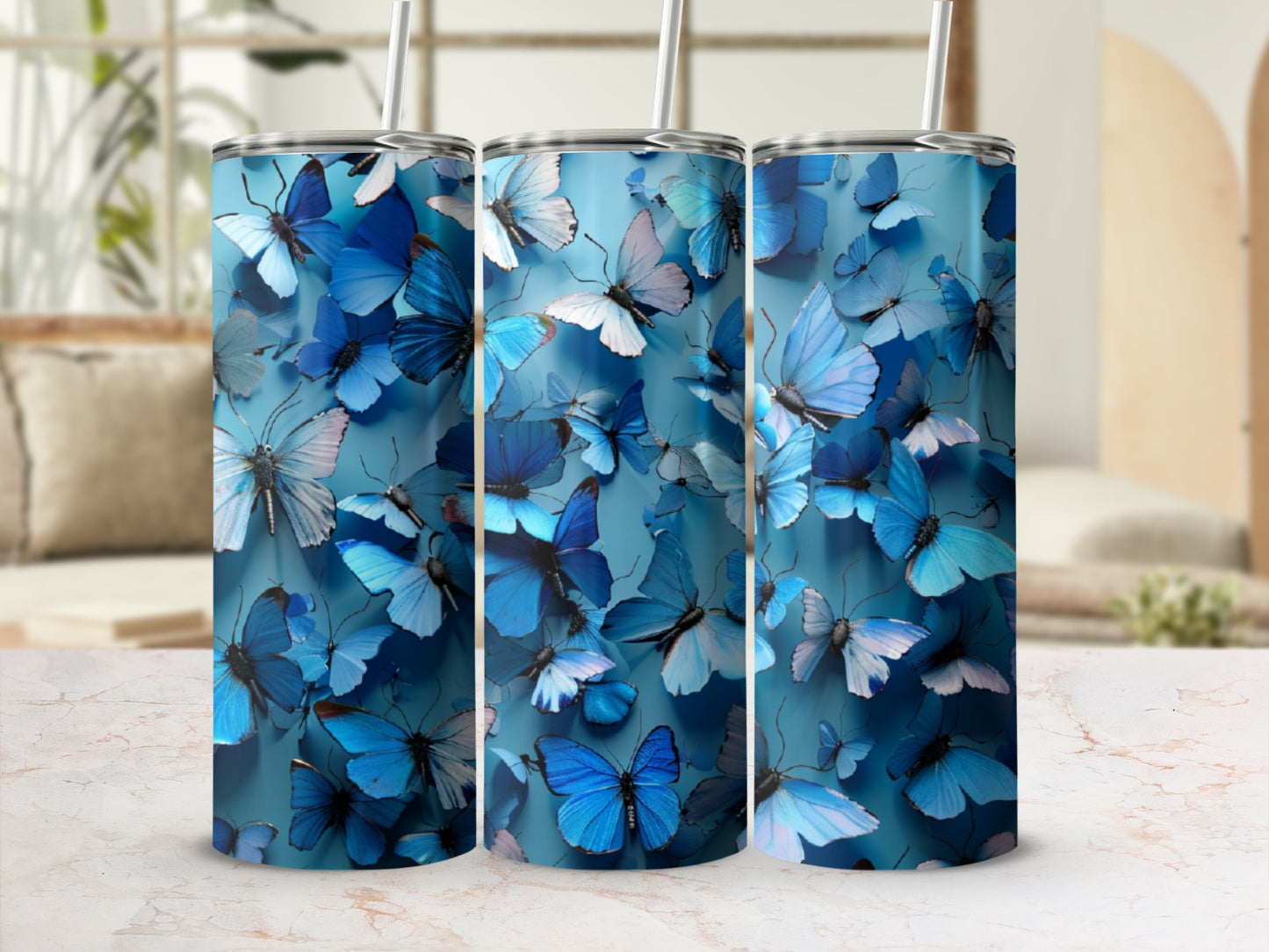 Blue butterflies on a tumbler with a light blue background.