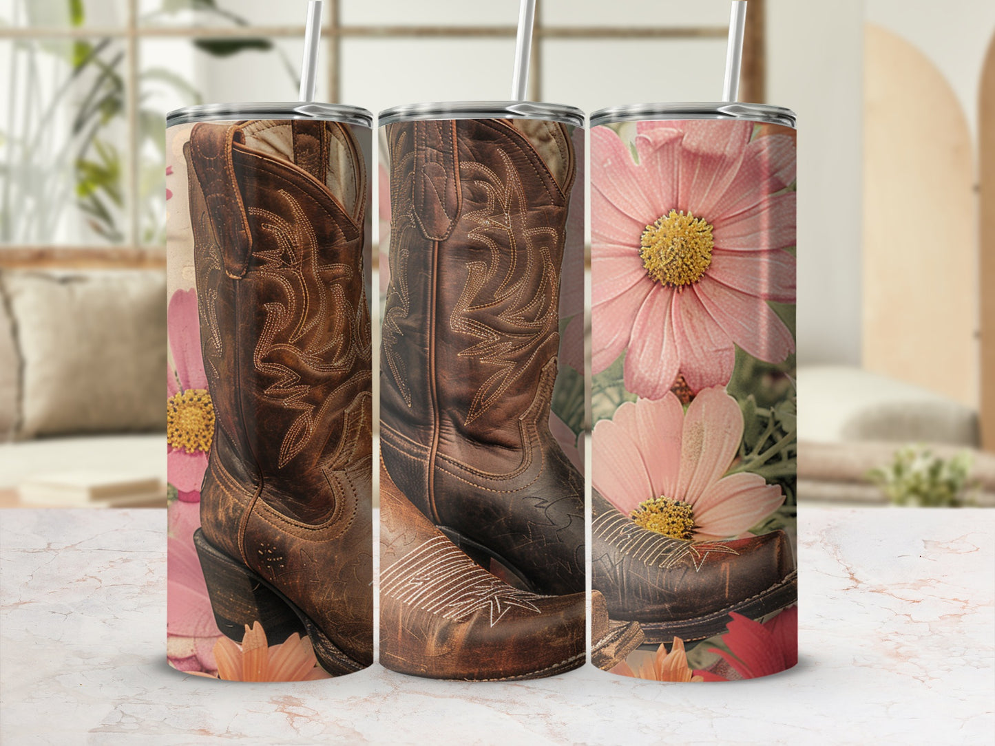 Cowboy boots and pink flowers on a tumbler, with a blurred background.