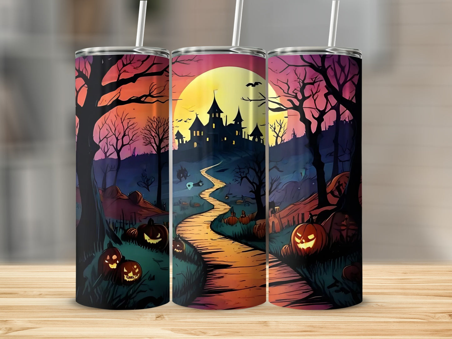 Halloween tumblers with spooky castle, pumpkins, and spooky trees under a large moon.