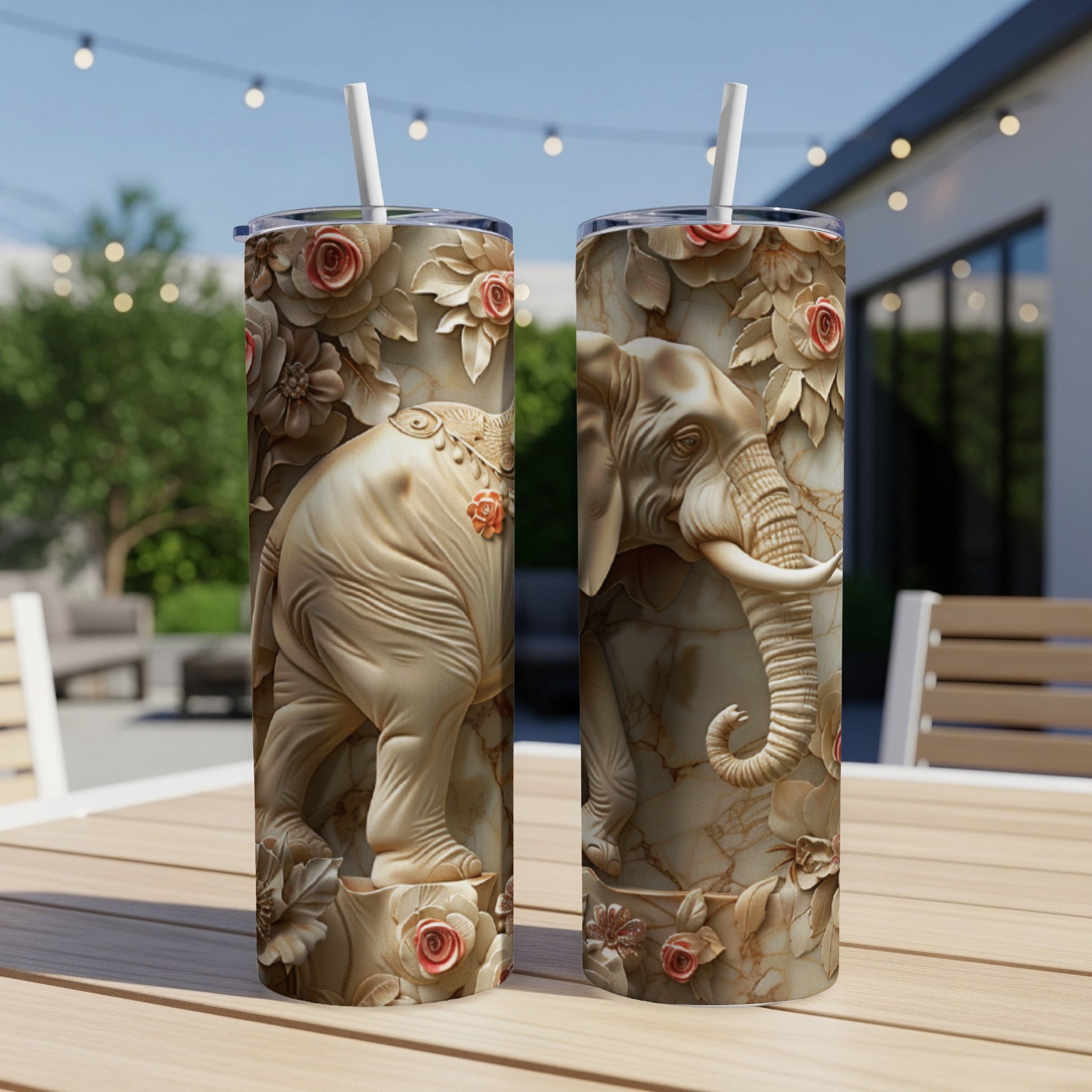 Two tall tumblers featuring a detailed elephant with floral embellishments.