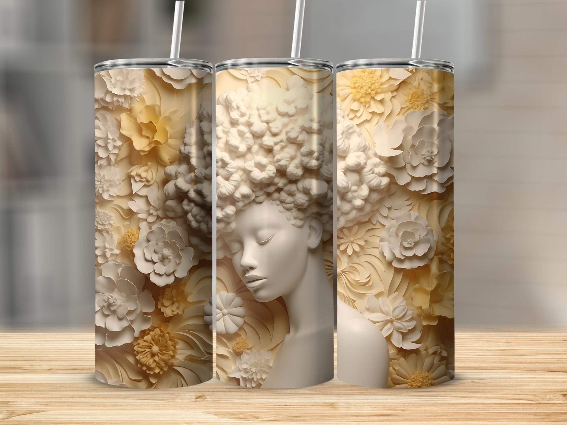Triptych of tumblers with floral hair on a bust against a neutral background.