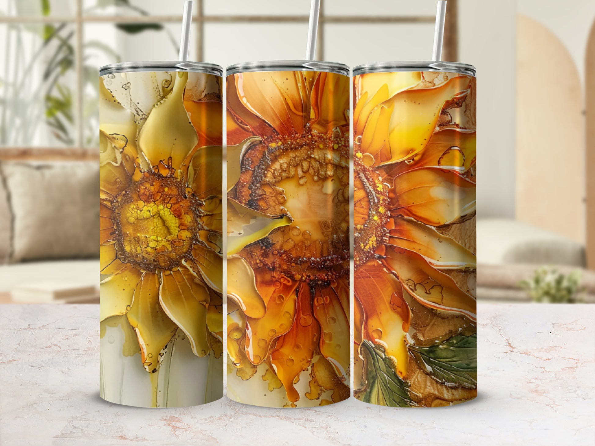 Three tumblers featuring a vibrant, abstract sunflower design.