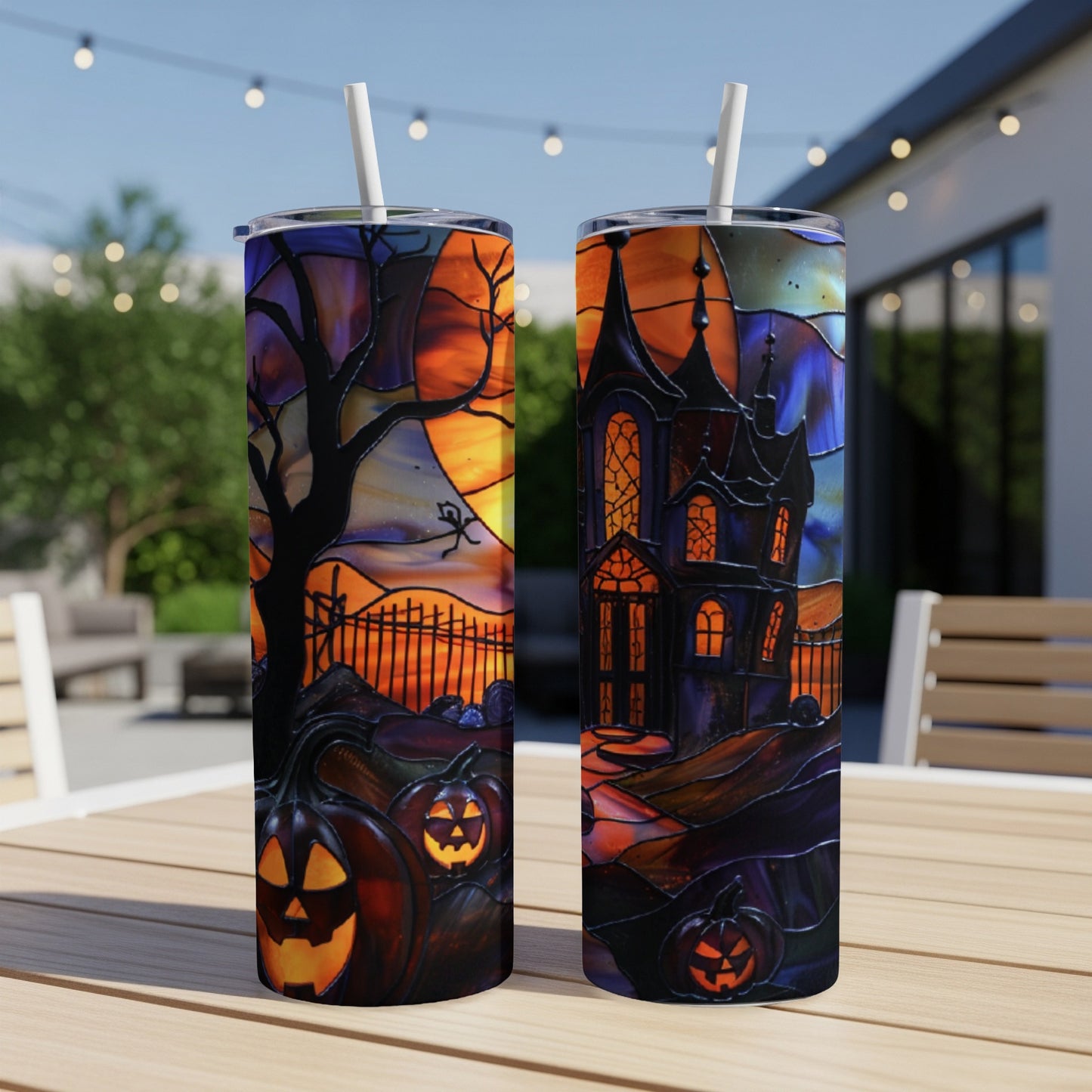 Two tumblers with stained-glass style Halloween scene: haunted house, pumpkins, spooky tree.