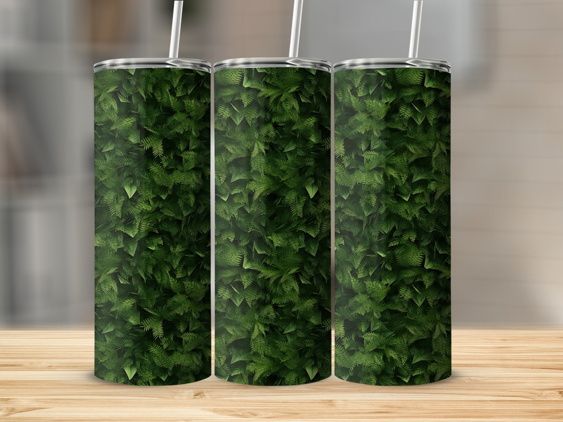 Trio of tumblers featuring a dense, green fern leaf pattern.