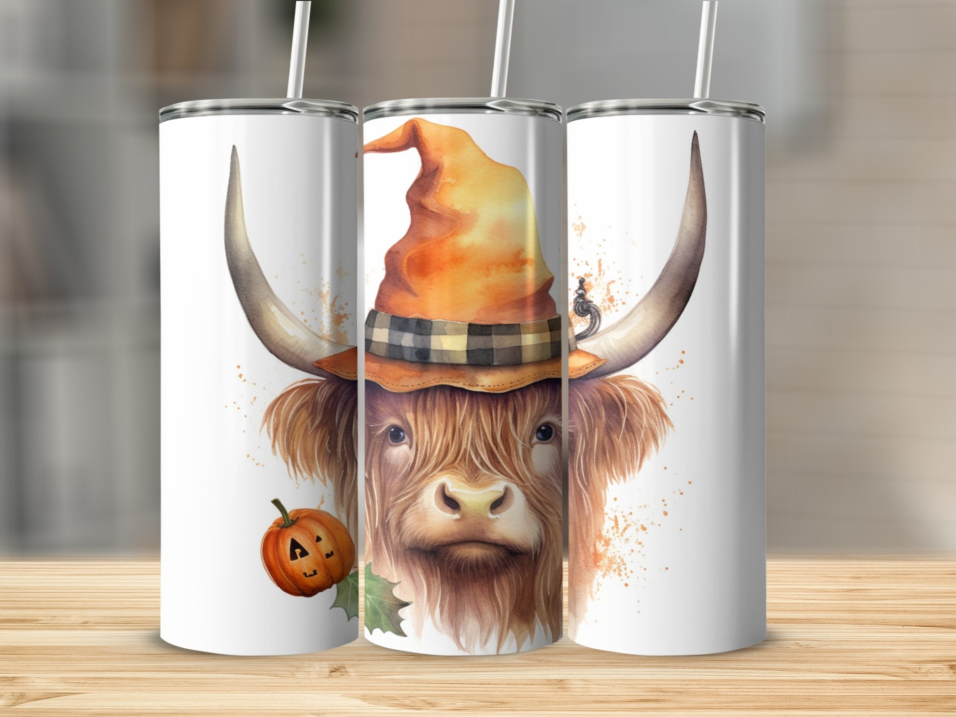 Highland cow wearing a witch hat with a pumpkin and fall leaves.
