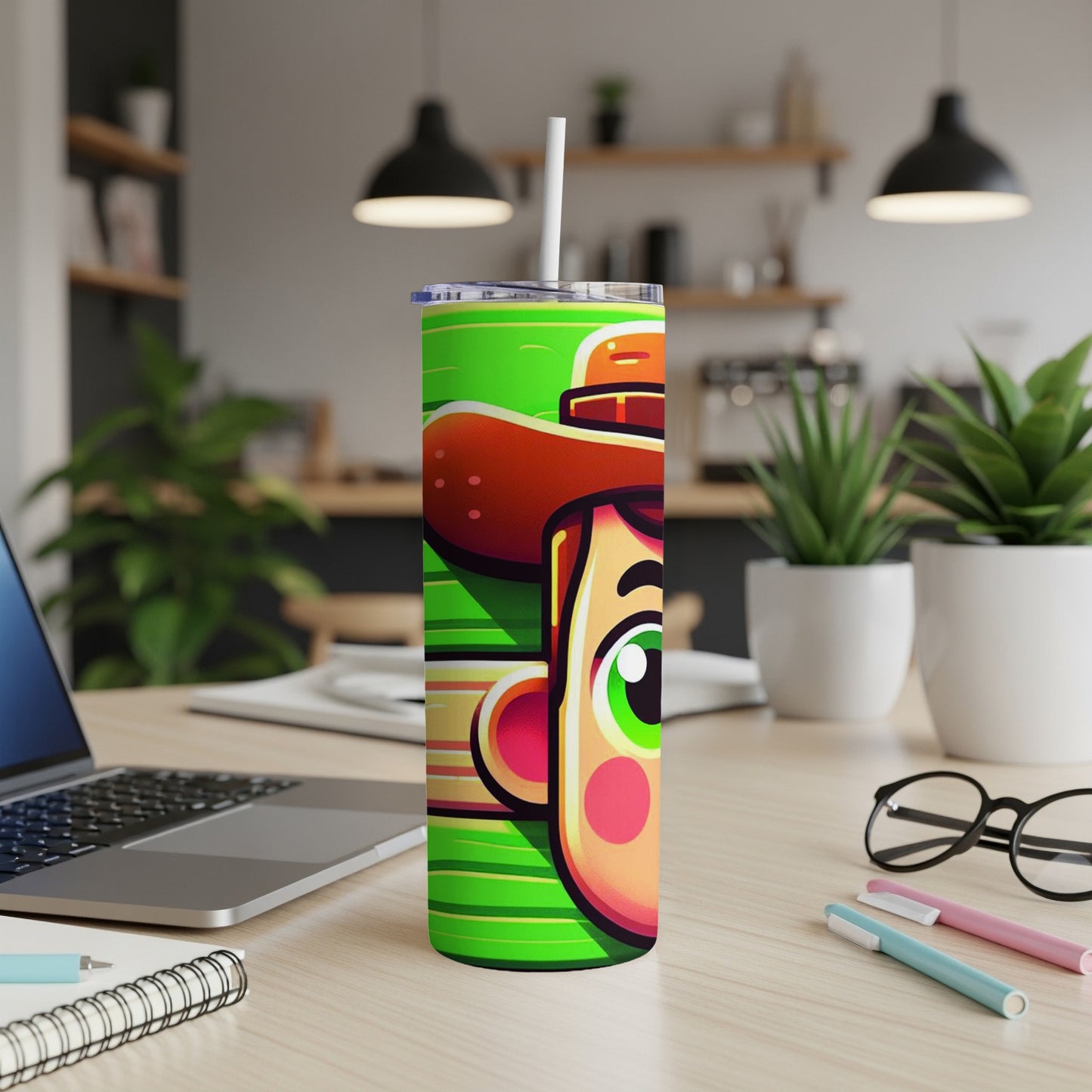 Green striped tumbler with cartoon cowboy face and a white straw.
