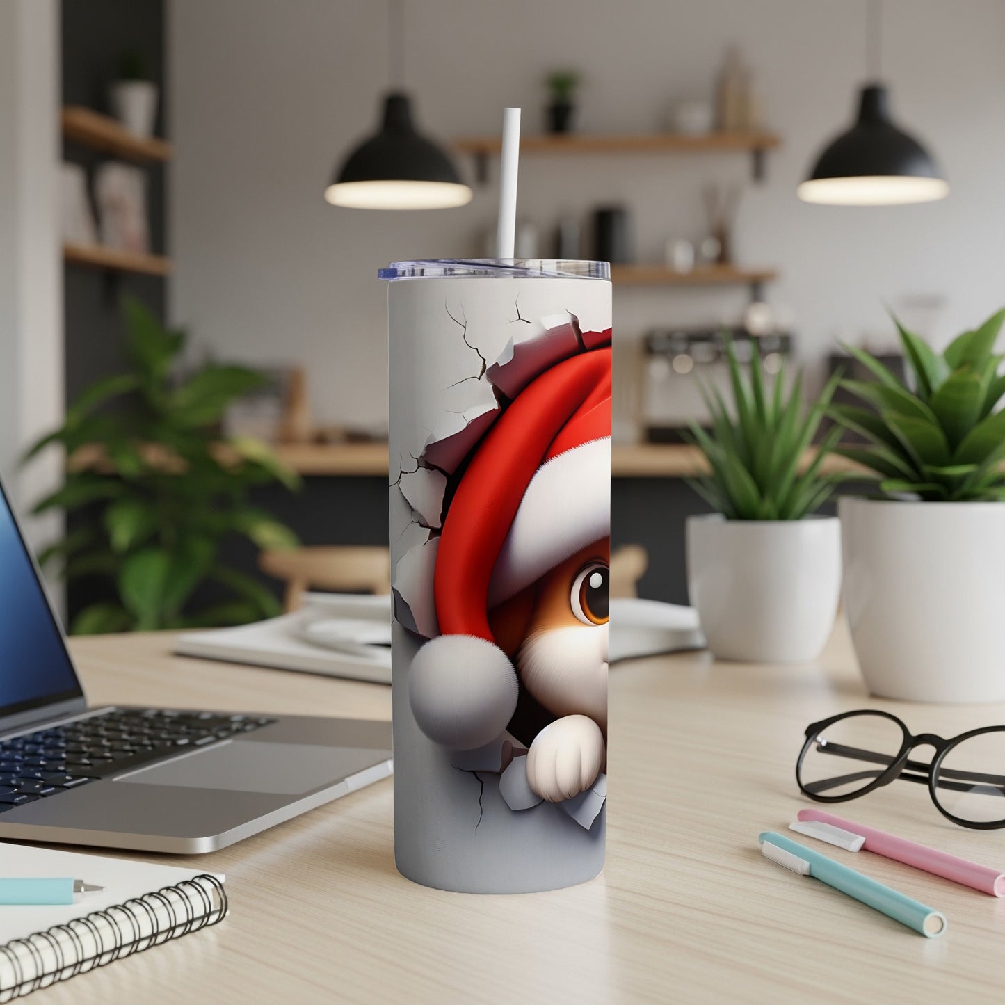 Christmas-themed tumbler with a cartoon cat breaking through the surface.