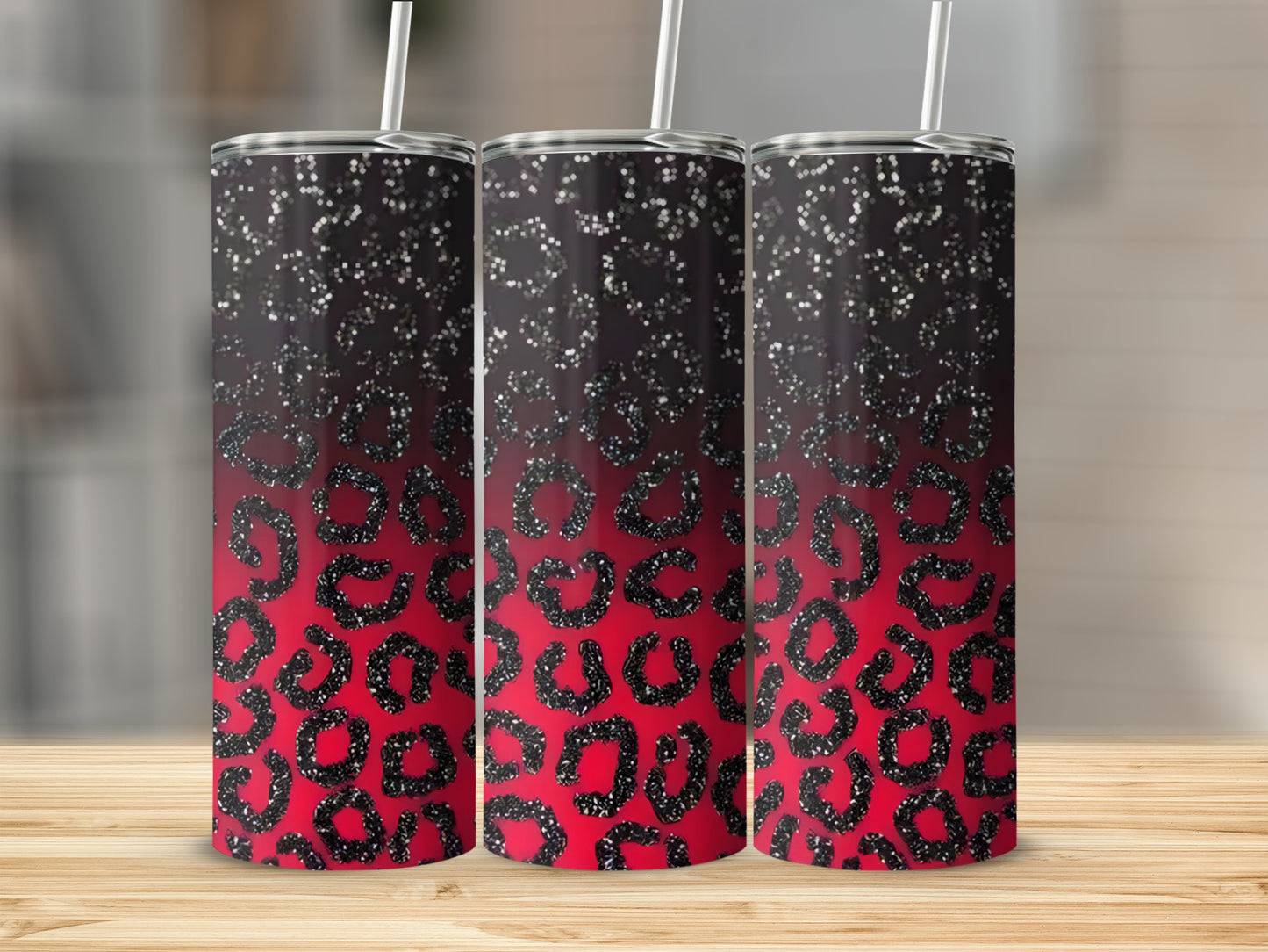 Three tumblers with red and black leopard print glitter pattern.