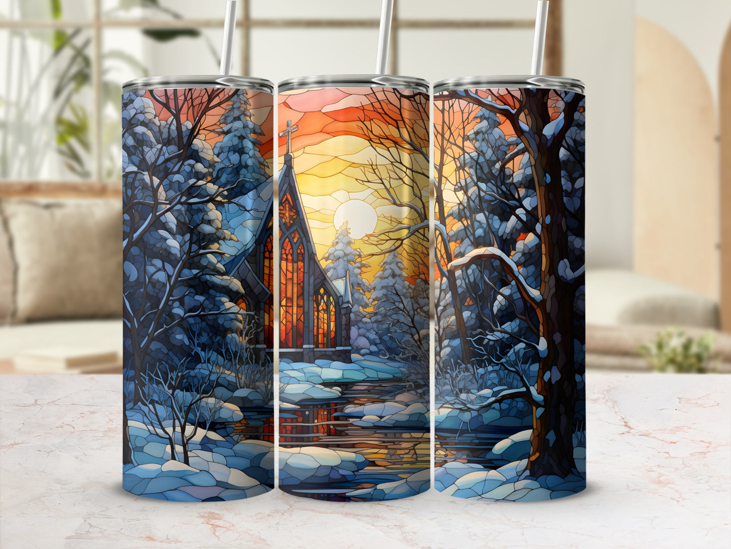 Three tumblers featuring a snowy church scene with a sunset.