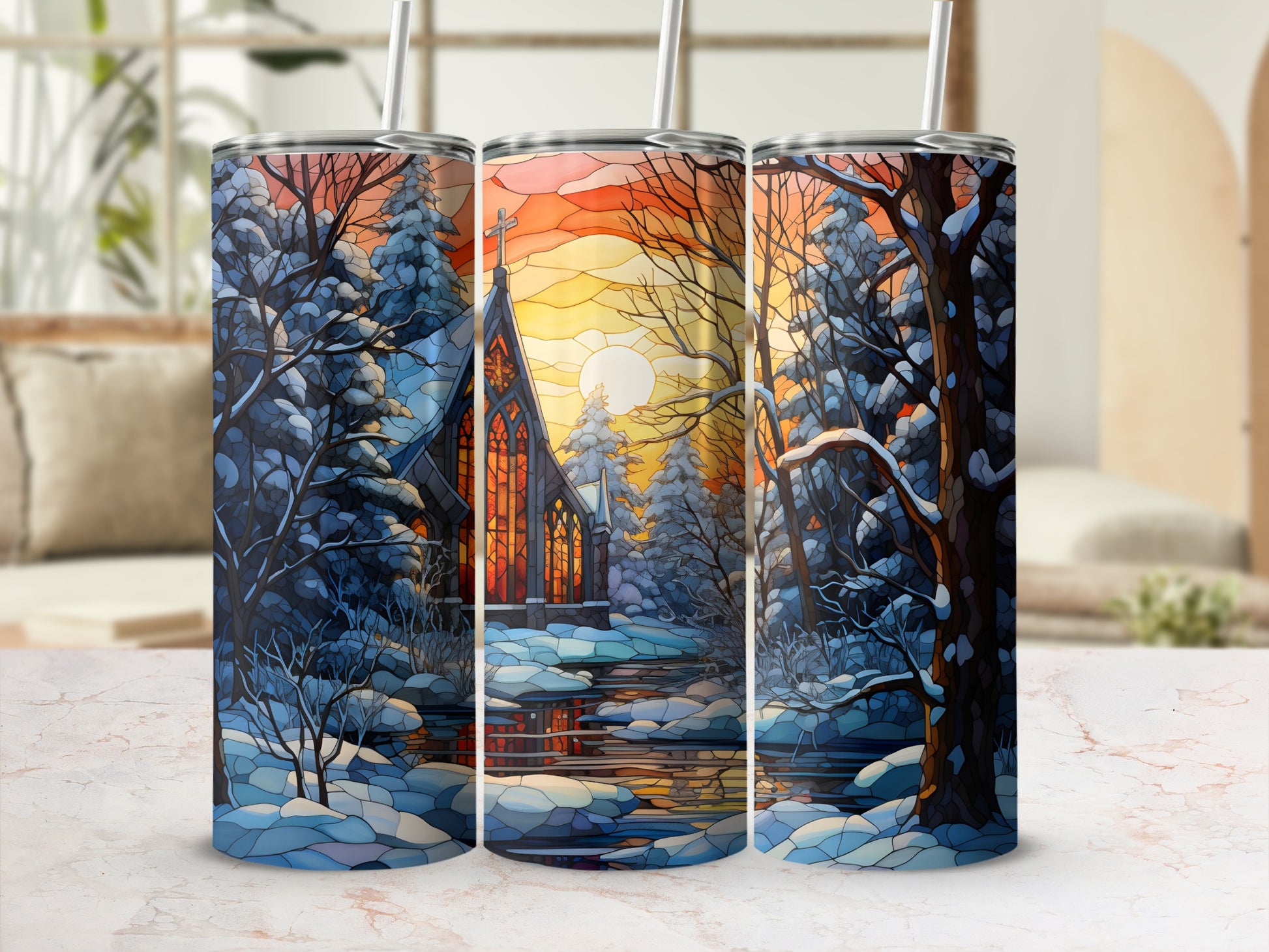 Three tumblers featuring a snowy church scene with a sunset.