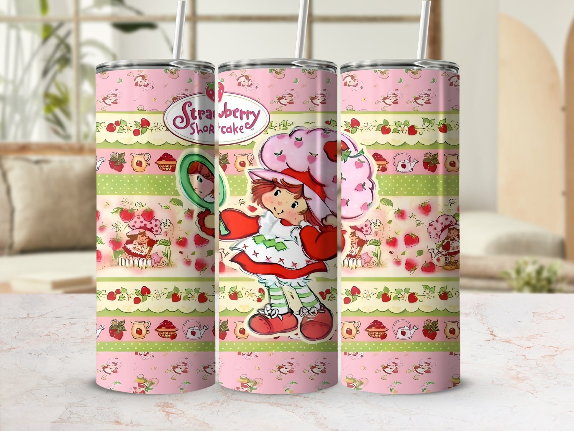 Strawberry Shortcake design on a tumbler with striped background.